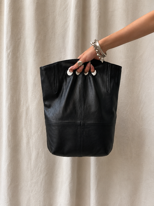 Black leather handbag from the upcycled collection